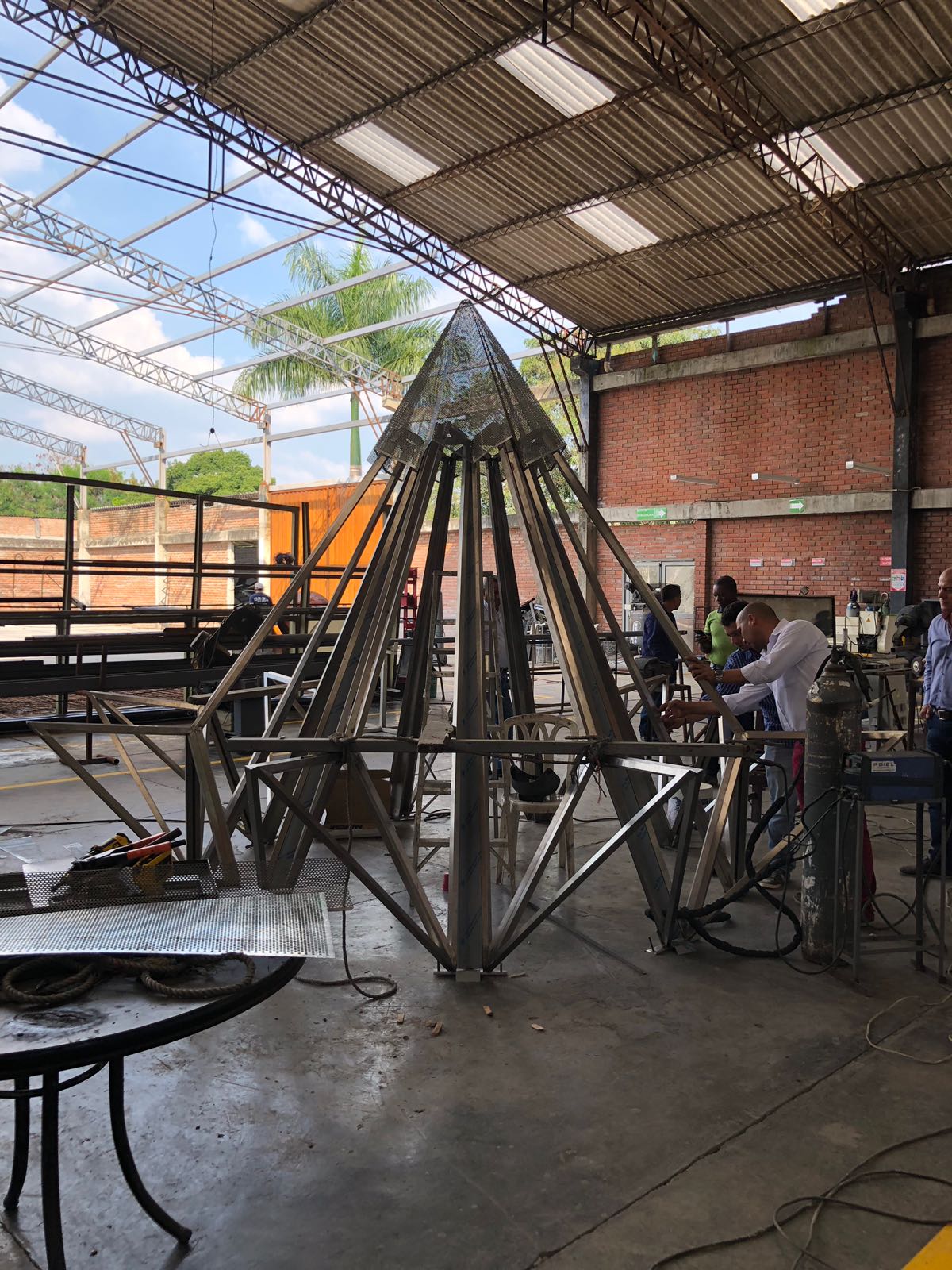 The crowning piece of the roof of the House of Worship in Norte del Cauca, from which the Greatest Name will be hung.