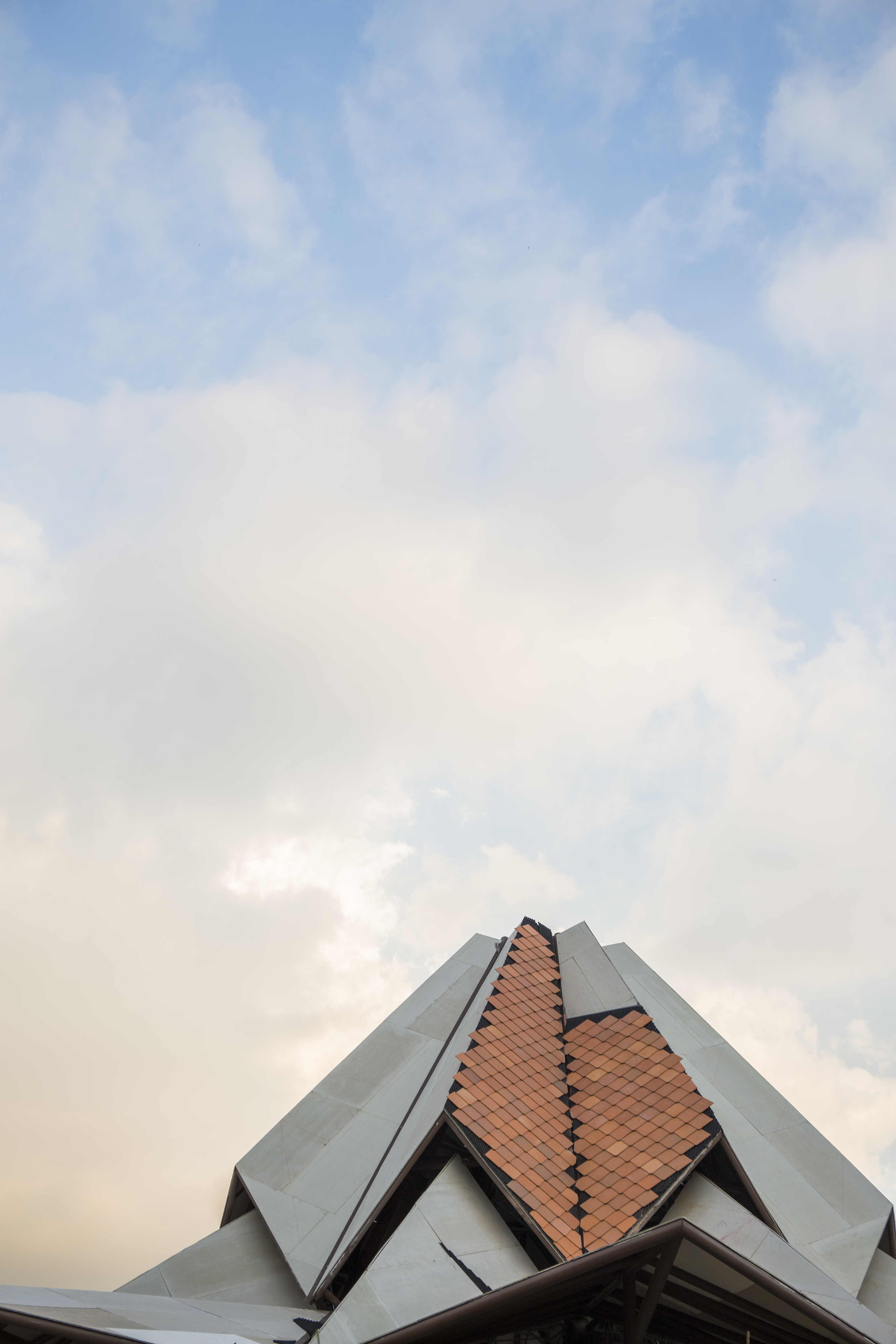 Roof tiles being put in place on the roof of the House of Worship in Norte del Cauca, Colombia