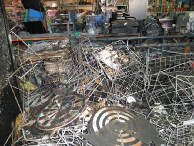 Wreckage in a Baha'i-owned stationery shop, after an attack by unknown arsonists on 22 November, 2010.