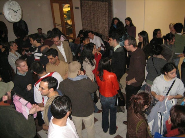 Participants engage in conversation between sessions.