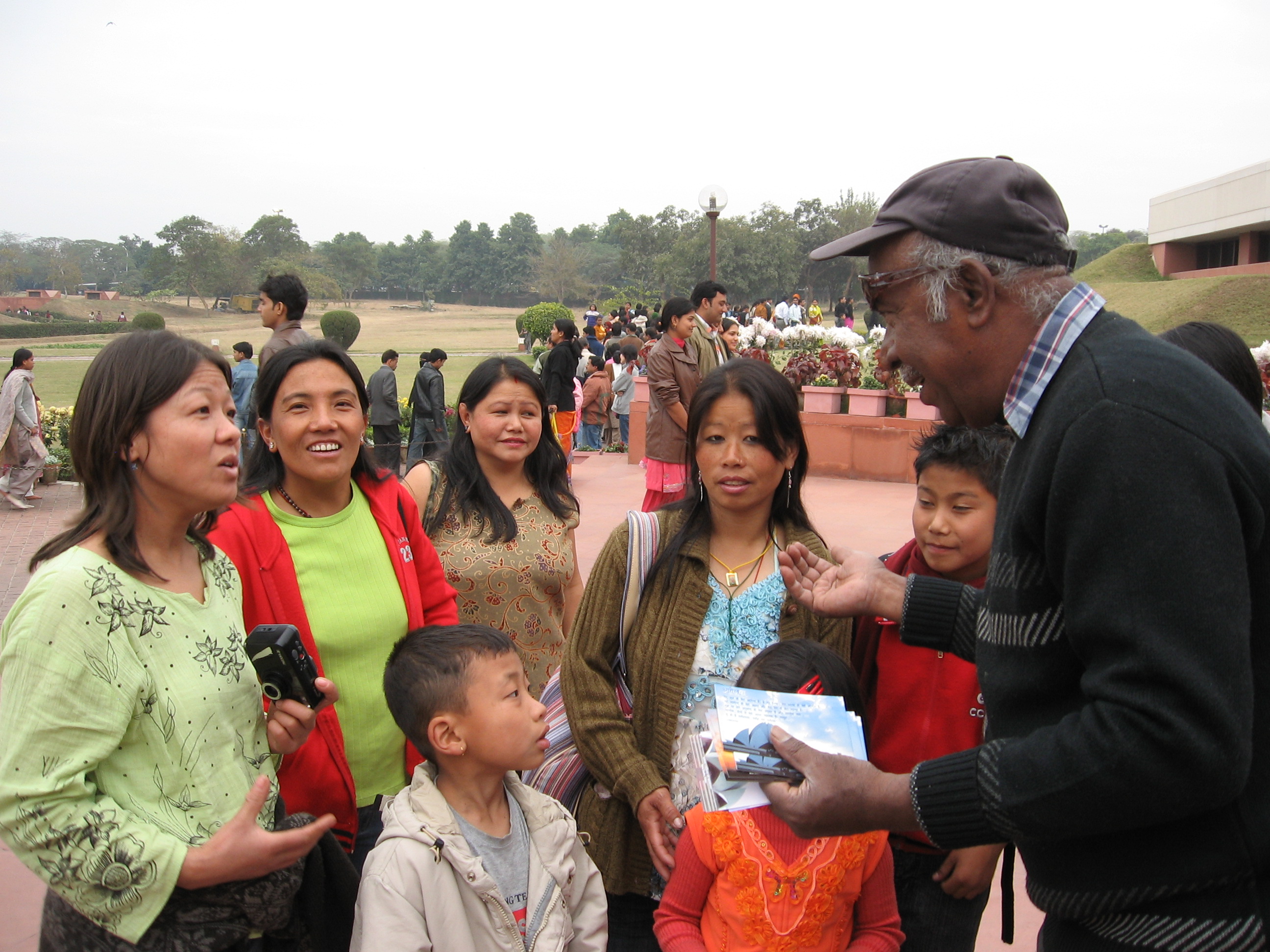 Mohan Vijaykumar, right, works in security and when circumstances permit likes to welcome visitors. He speaks half a dozen Indian languages as well as English, and knows phrases in many more languages. Thousands of visitors have heard his friendly greeting.