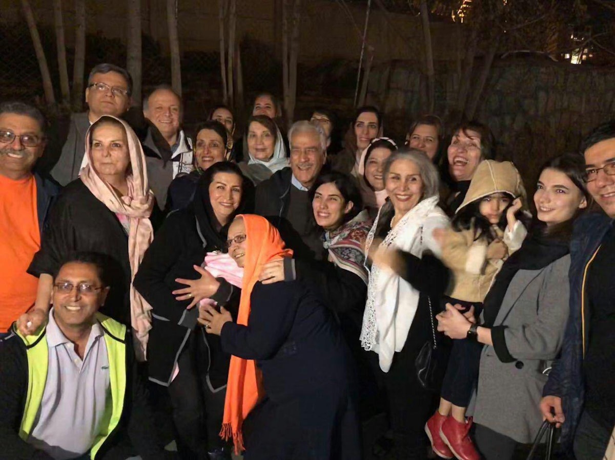 Jamaloddin Khanjani (center) reunited with friends and family