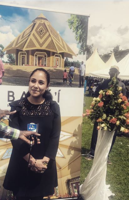 Architect Neda Samimi speaks with a news anchor about the Temple design.