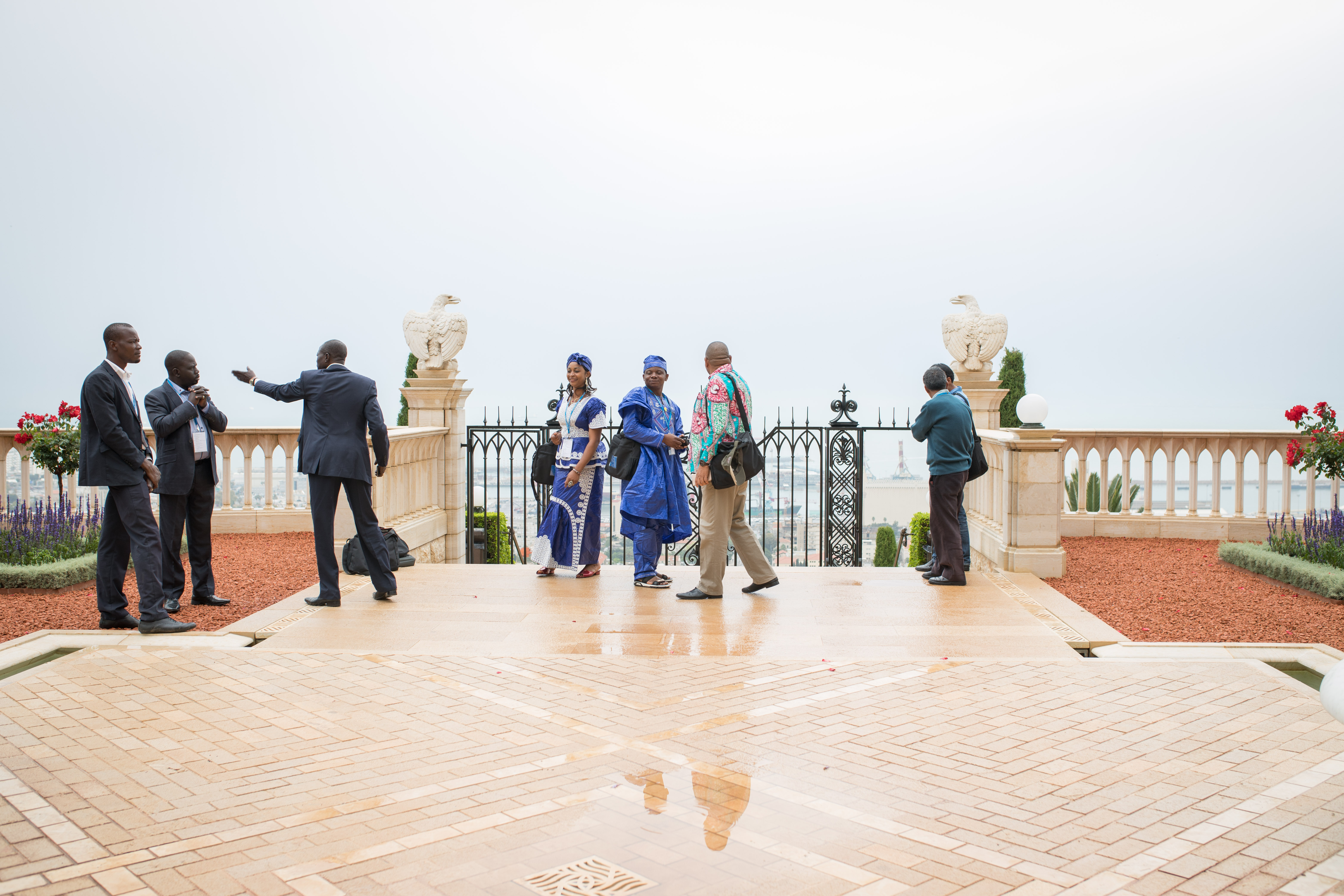 Delegates arrived in Haifa today for the 12th International Baha’i Convention. Before the event begins, they have a few days to visit the Shrines and holy places. Here delegates stand on the terraces of the Shrine of the Bab.