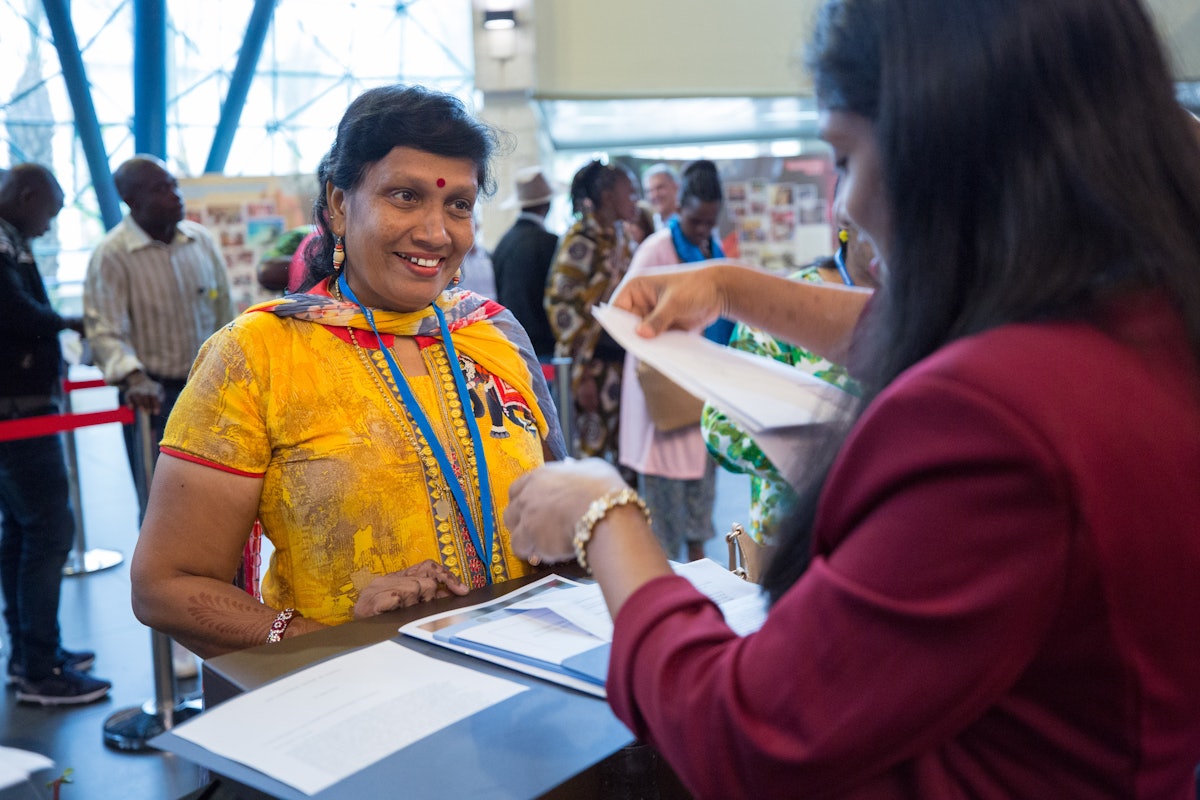 A delegate from the Andaman and Nicobar Islands registers for International Convention.