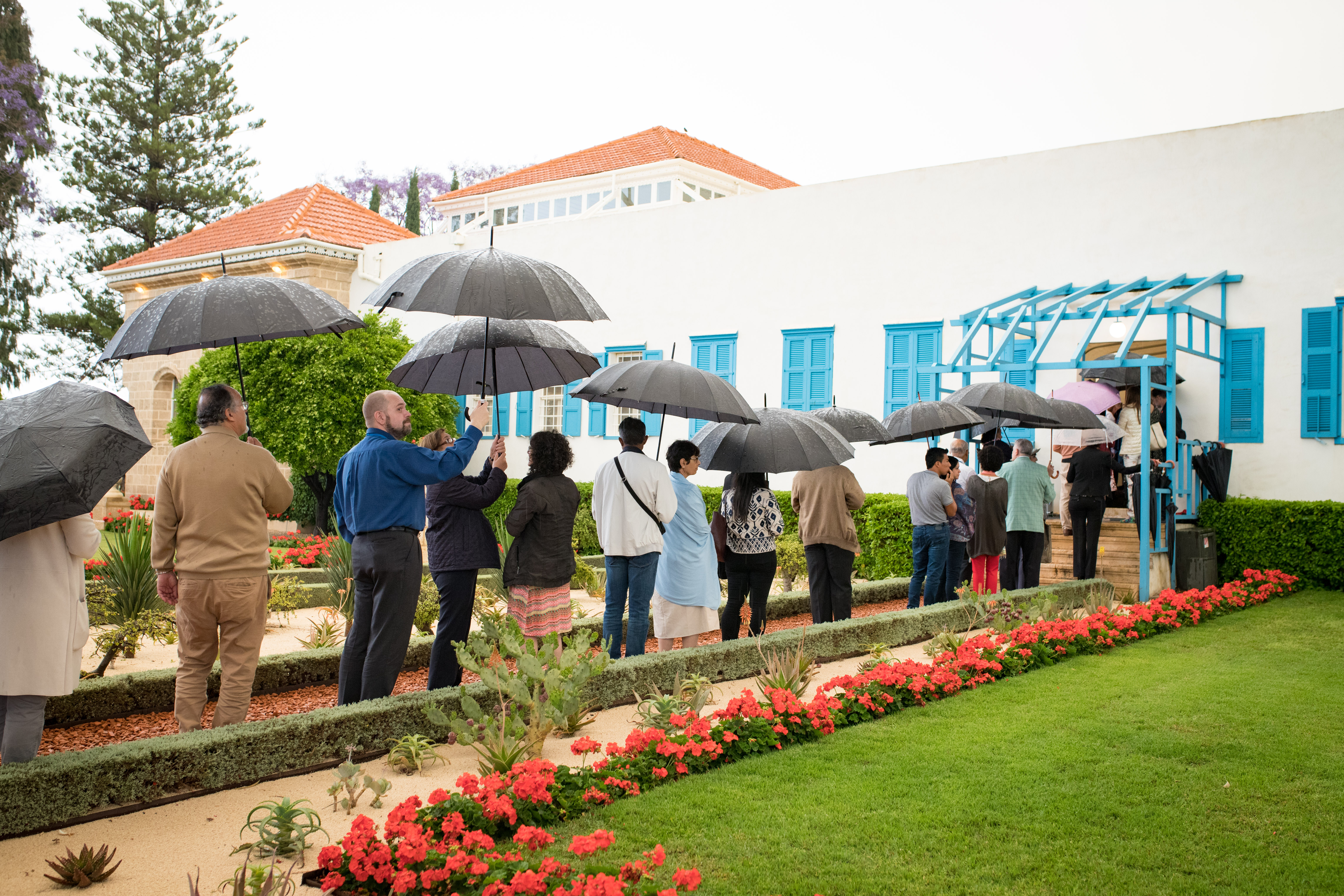Delegates from around the world enter the Shrine of Baha’u’llah.