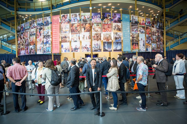 Delegates from around the world stand in line at the Haifa International Convention Centre.