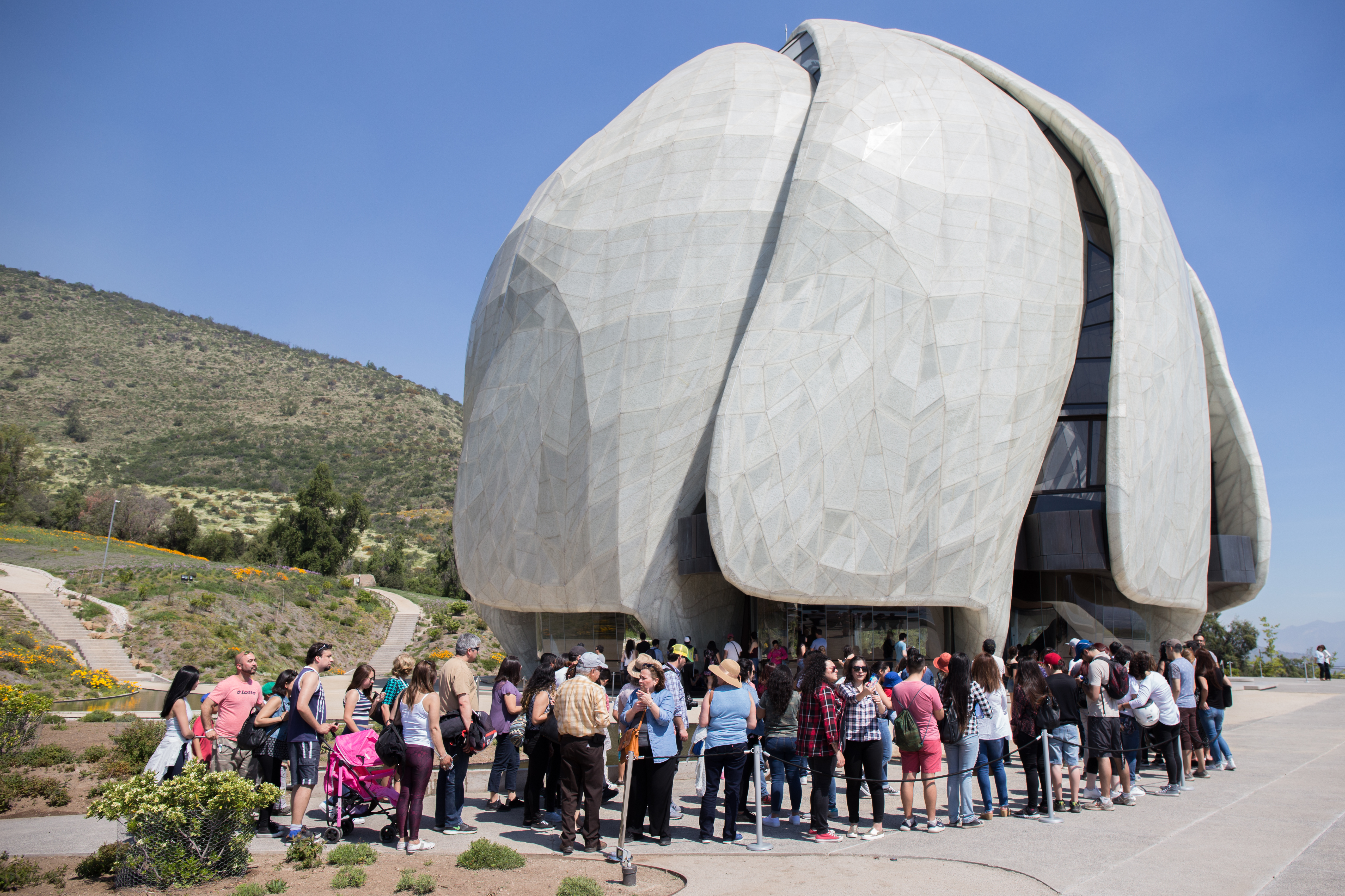 Visitors gather outside the central edifice.