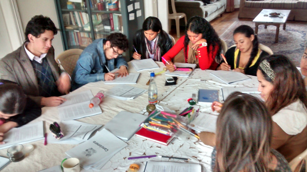 Participants in Colombia break out into small groups to study and discuss together.