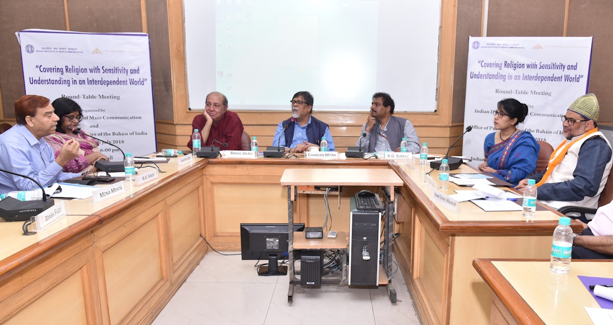 (From left) Mr. Singh; Ms. Jain; Mr. Rahul Jalali, a former president of the Press Club of India; Dr. Mitra;  Mr. Suresh; Mrs. Nilakshi Rajkhowa, the director of the Office of Public Affairs of the Baha’is of India; and Syed Babar Ashraf, Chief Coordinator of Sufi Federation of India, were among the participants in Saturday’s roundtable meeting held at the Indian Institute of Mass Communication in New Delhi.