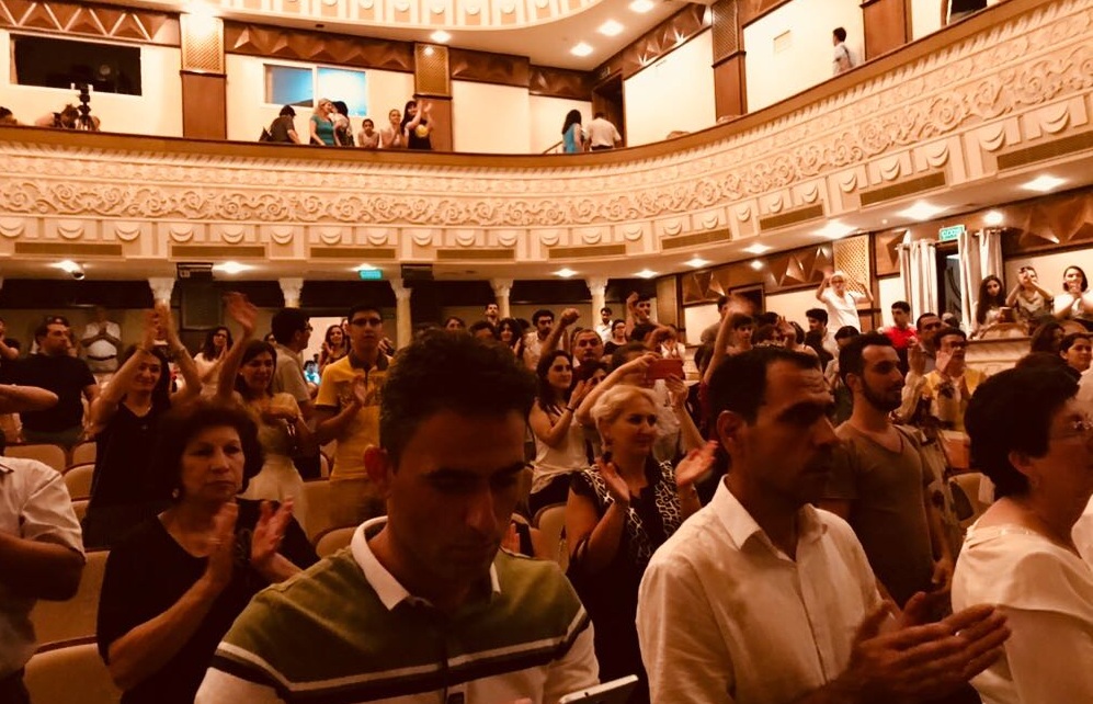 Audience members give Daughter of the Sun a standing ovation in its debut earlier this month.