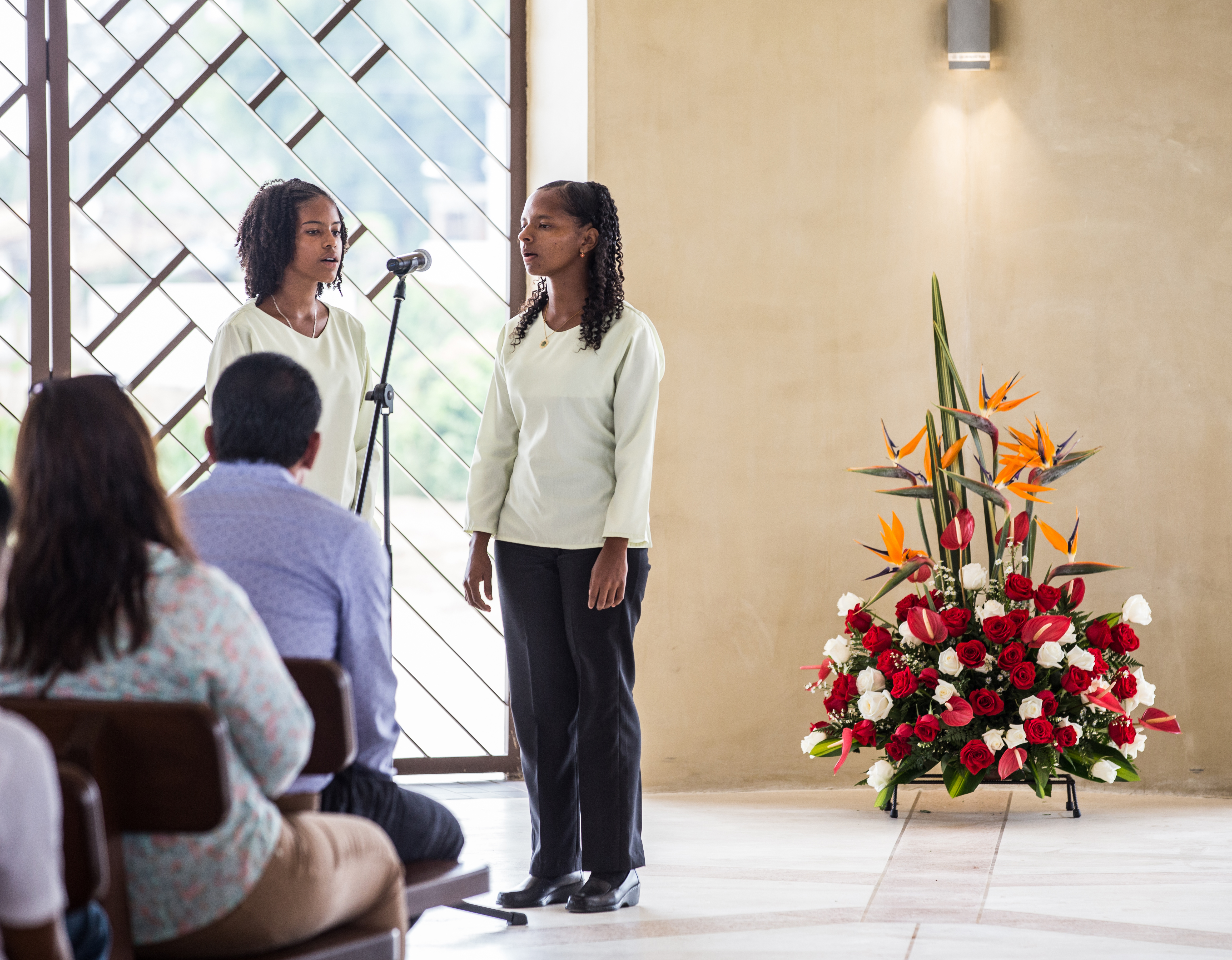 Members of the choir sing a passage from the Baha’i writings during a recent devotional program in the House of Worship.
