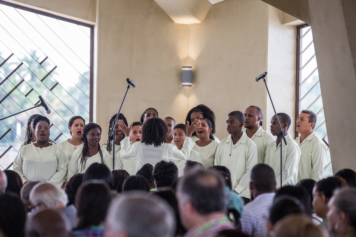 The choir sings a selection from the Baha’i writings during the devotional program Sunday at the House of Worship.