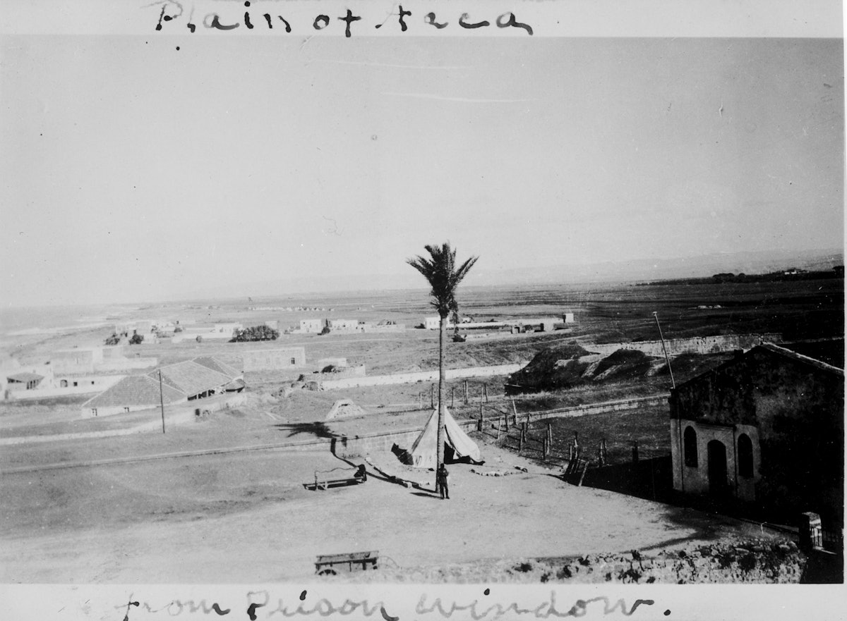 This photo, taken around 1900, shows the view from inside the prison quarters, looking north to the plain of Akka.