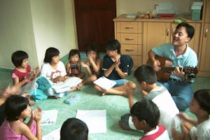 Video: Mr. Lim leads a song during a class in his home village of Jenjarom. He teaches classes for both children and young teens, sponsored by the local Baha'i community.