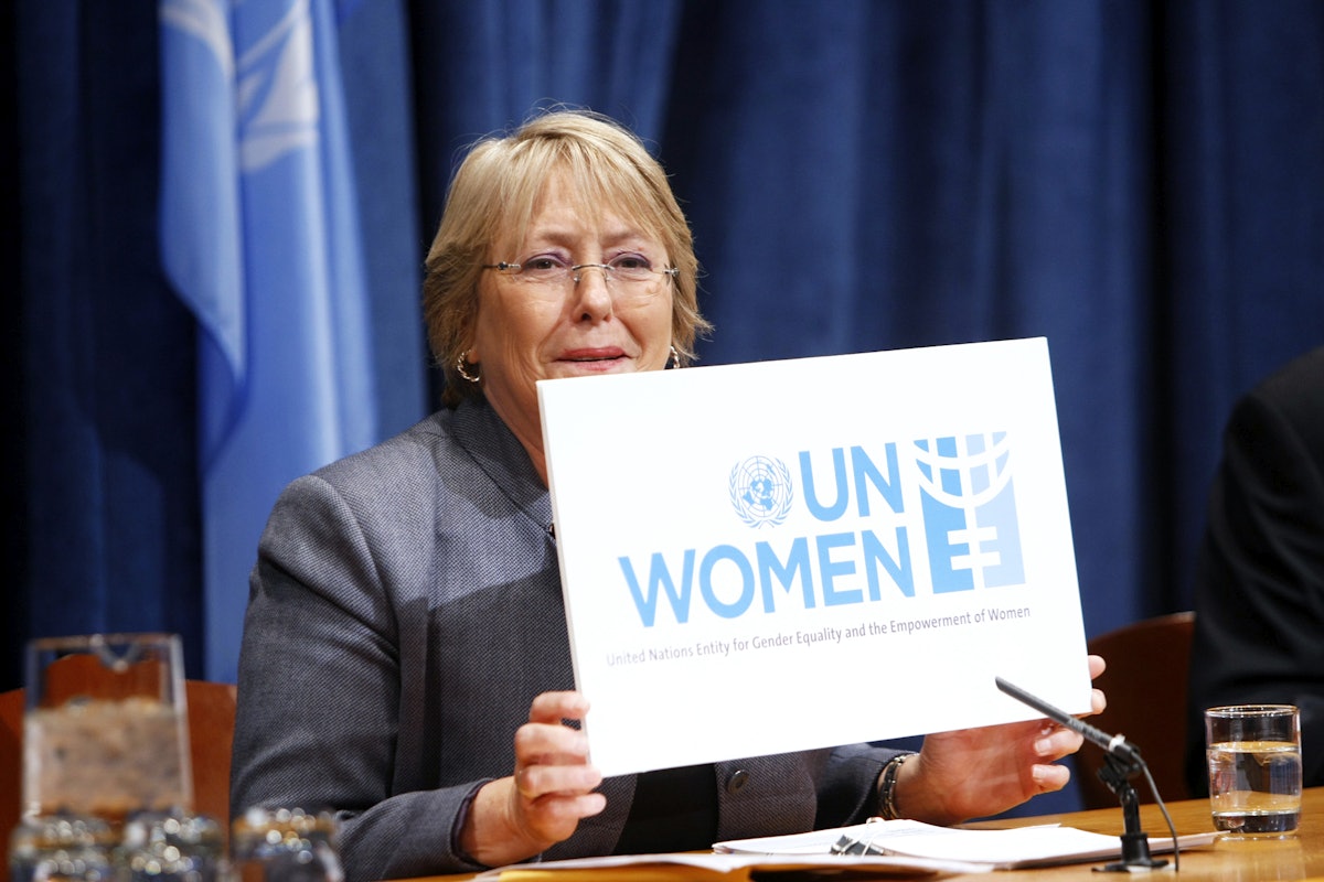 Former Chilean President, Michelle Bachelet – Executive Director of the newly-created UN Women – holds up a sign for the organization during a press conference on UN Women priorities for 2011. UN Photo by Paulo Filgueiras.