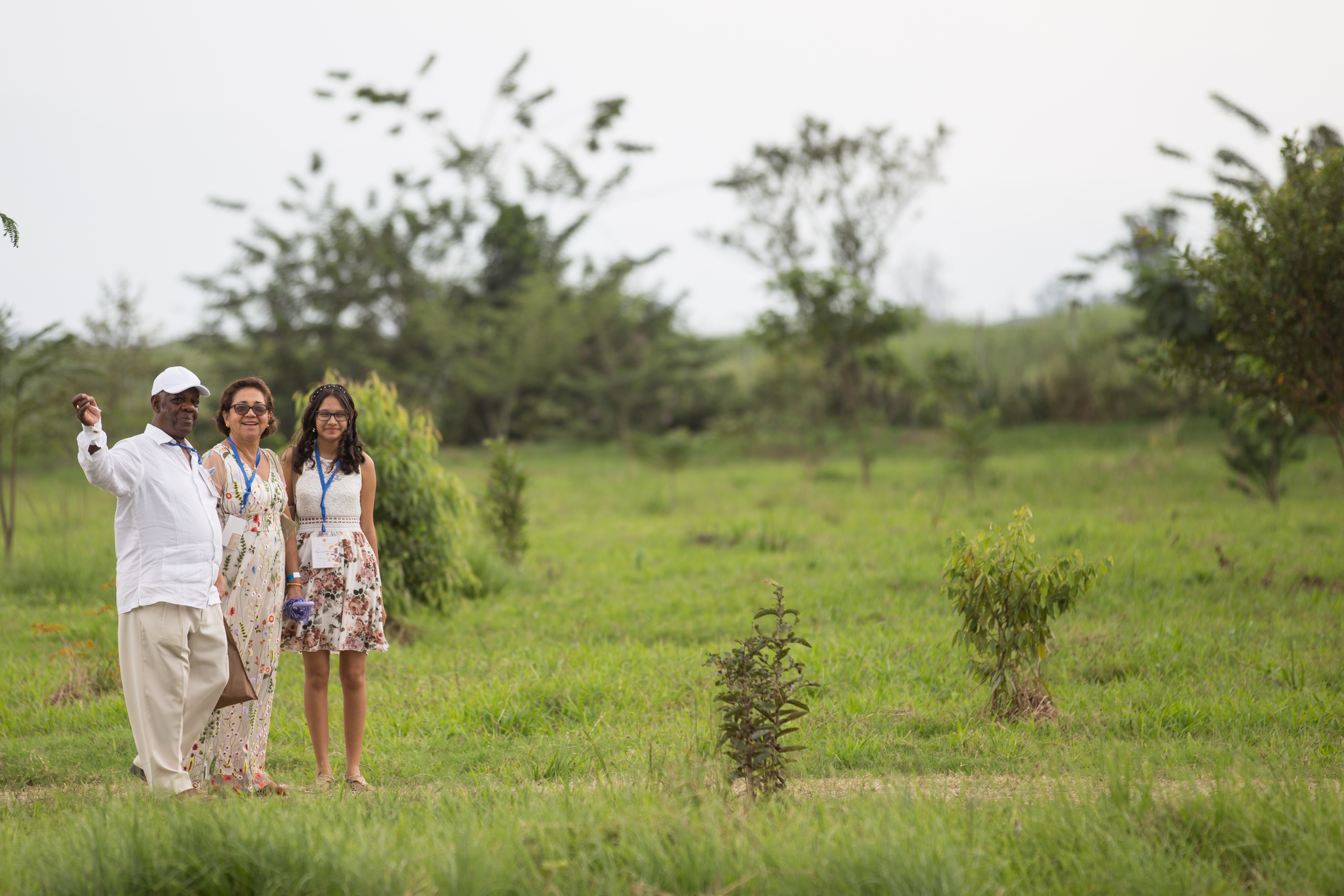 Participants in the dedication ceremony tour a burgeoning native forest that is part of the Temple site. Called the Bosque Nativo, the growing forest stands in contrast to the surrounding fields of sugar cane that have overtaken the region’s once-diverse plant life.