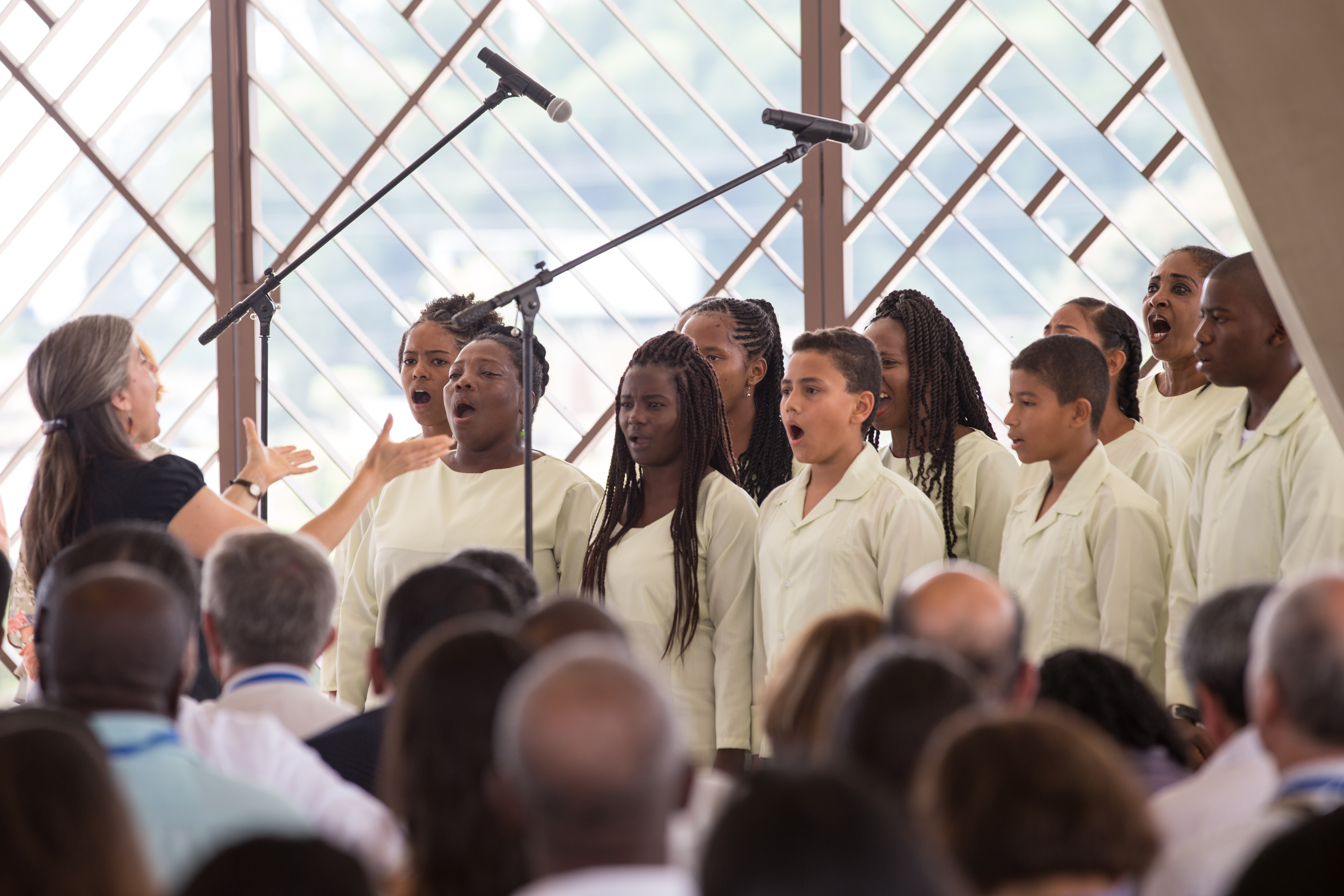 A choir sings a passage from the Baha’i writings during the devotional program inside the central edifice.