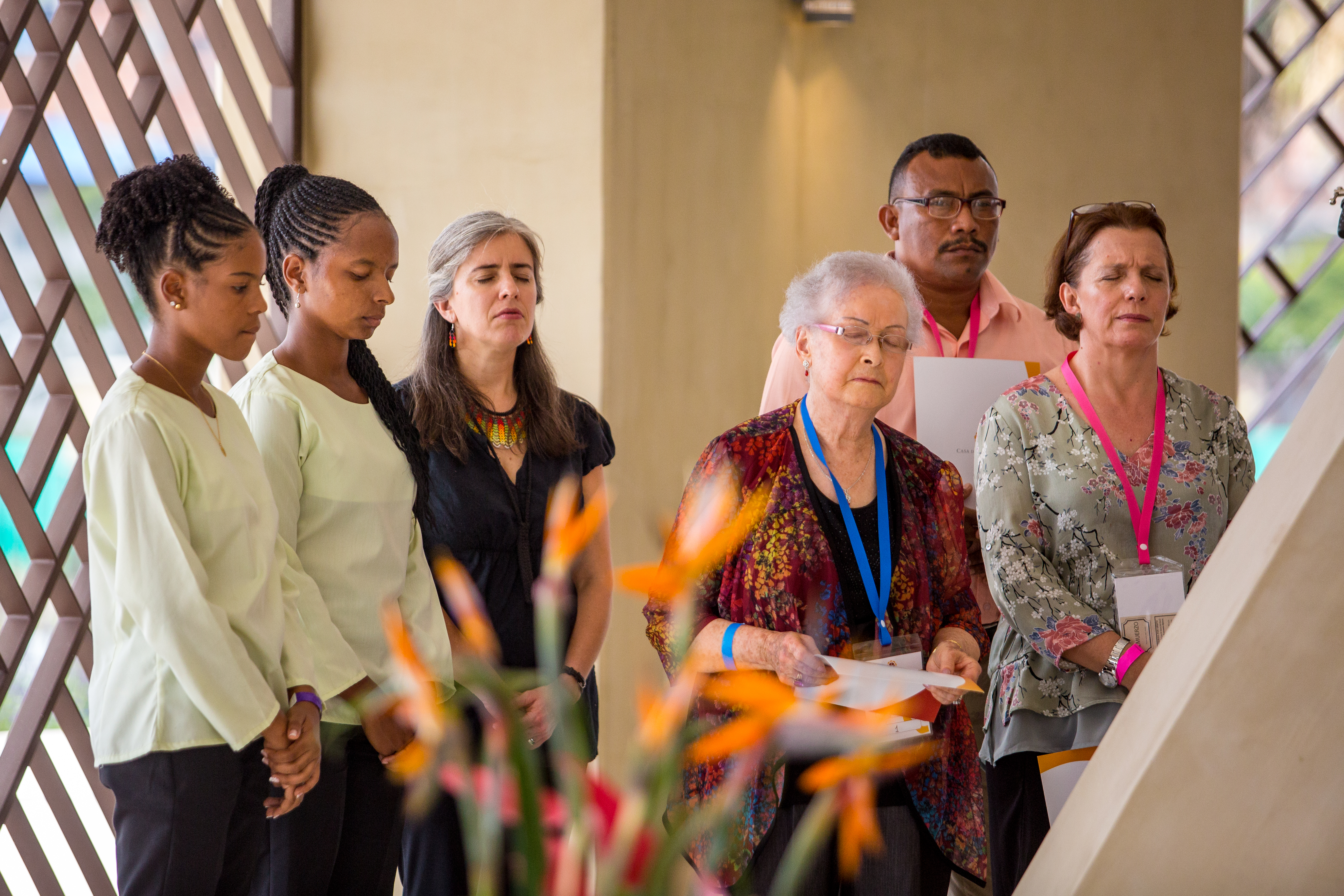 Some of the devotional program’s readers listen to prayers inside the Temple.