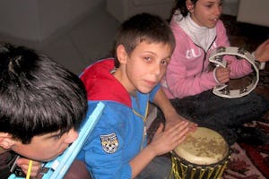 Video: Alberto Liccardi, 12, center, says he would like to tell other young people that there are better things to do than hanging out in the street. These youngsters are at the Baha’i class in Portici, Italy.