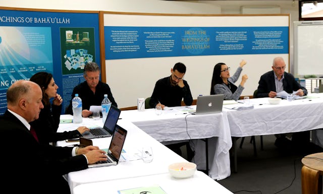 Ida Walker (second from right), who works with the Office of External Affairs in Australia, speaks in a seminar about social cohesion with participants from around the country. The gathering was held last week on the grounds of the Baha’i House of Worship in Sydney.