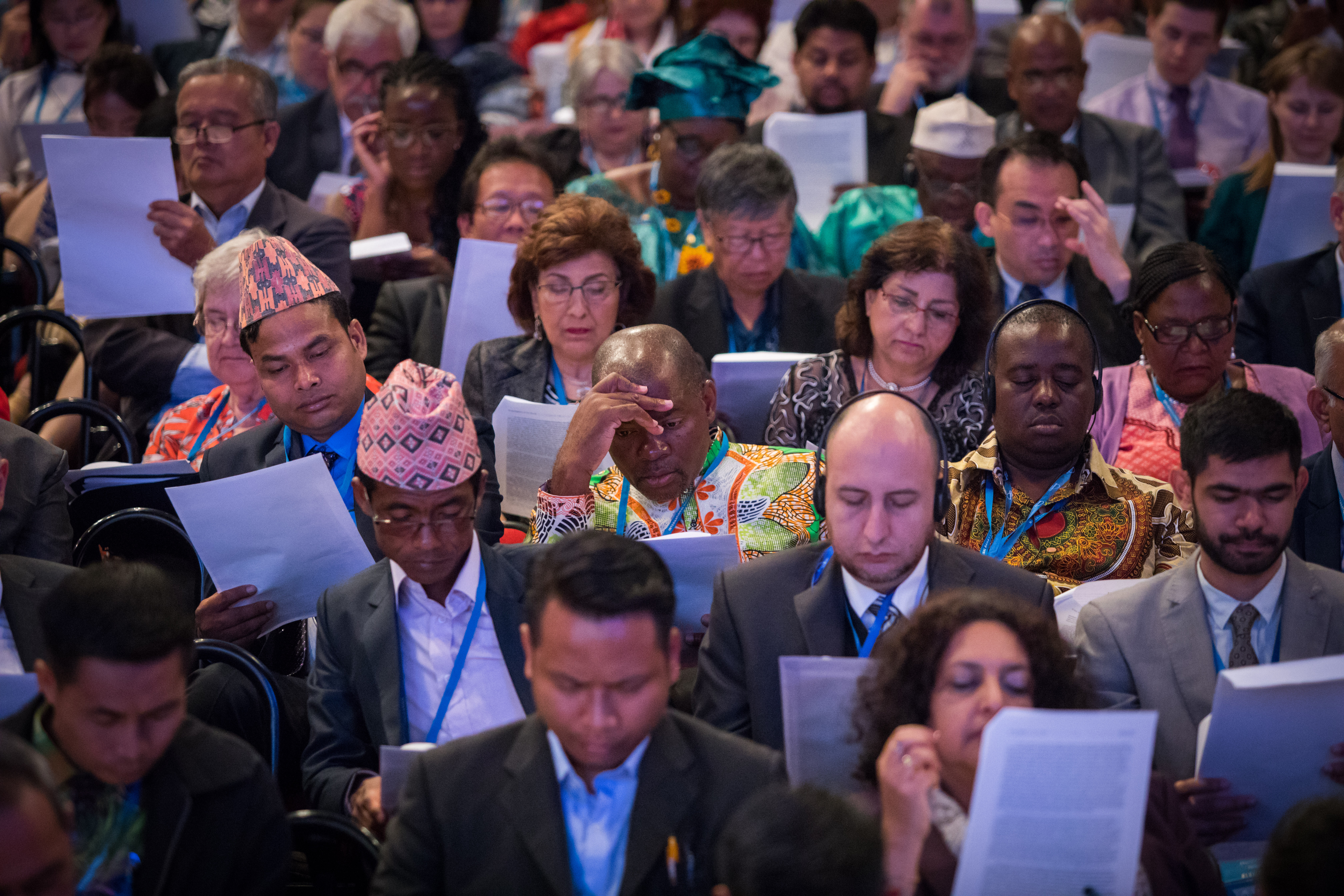 On 30 April, delegates study the annual Ridvan message written by the Universal House of Justice.