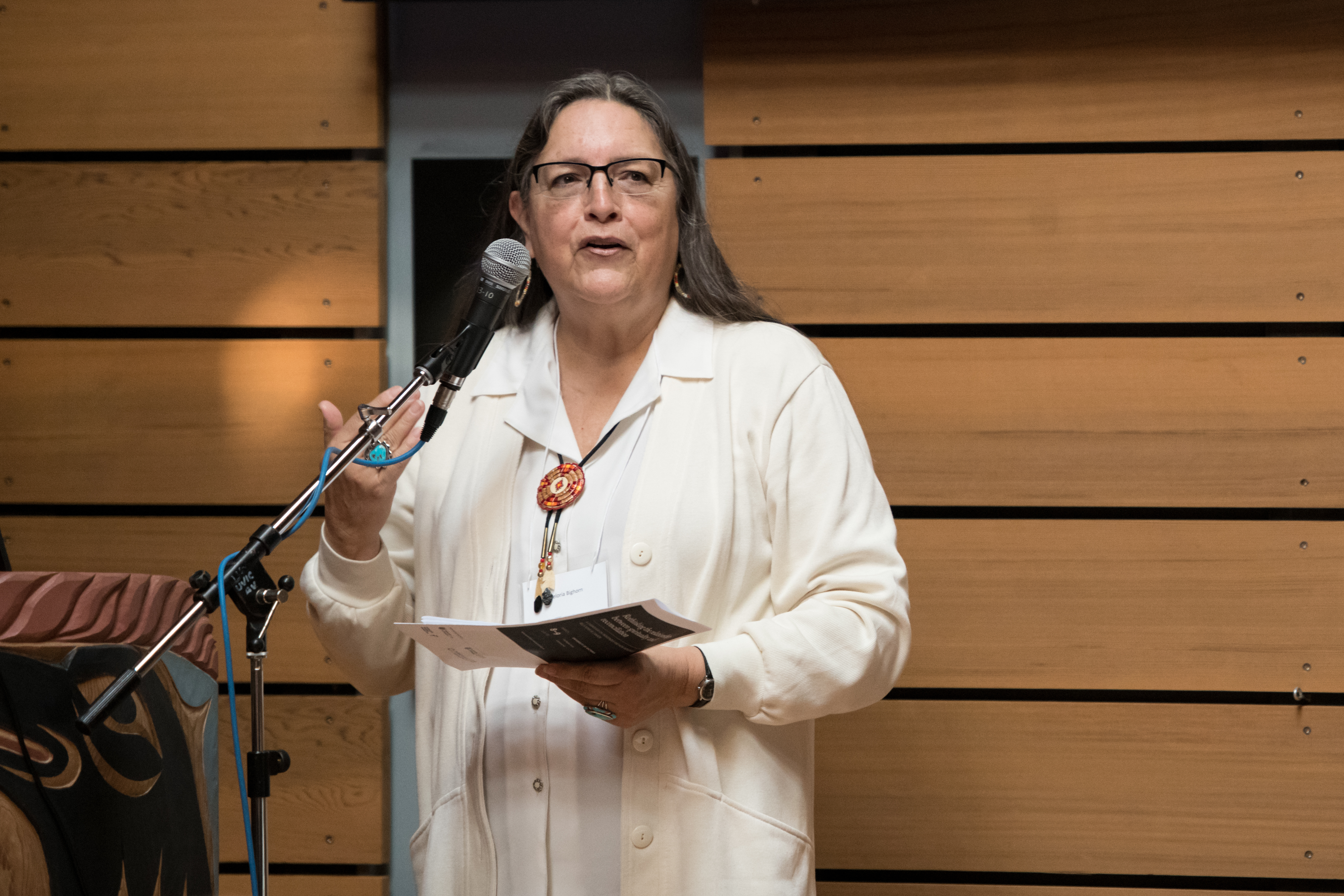 The Chairperson of National Spiritual Assembly of the Baha’is of Canada speaks during a symposium on reconciliation between the Indigenous and non-Indigenous people of the country.