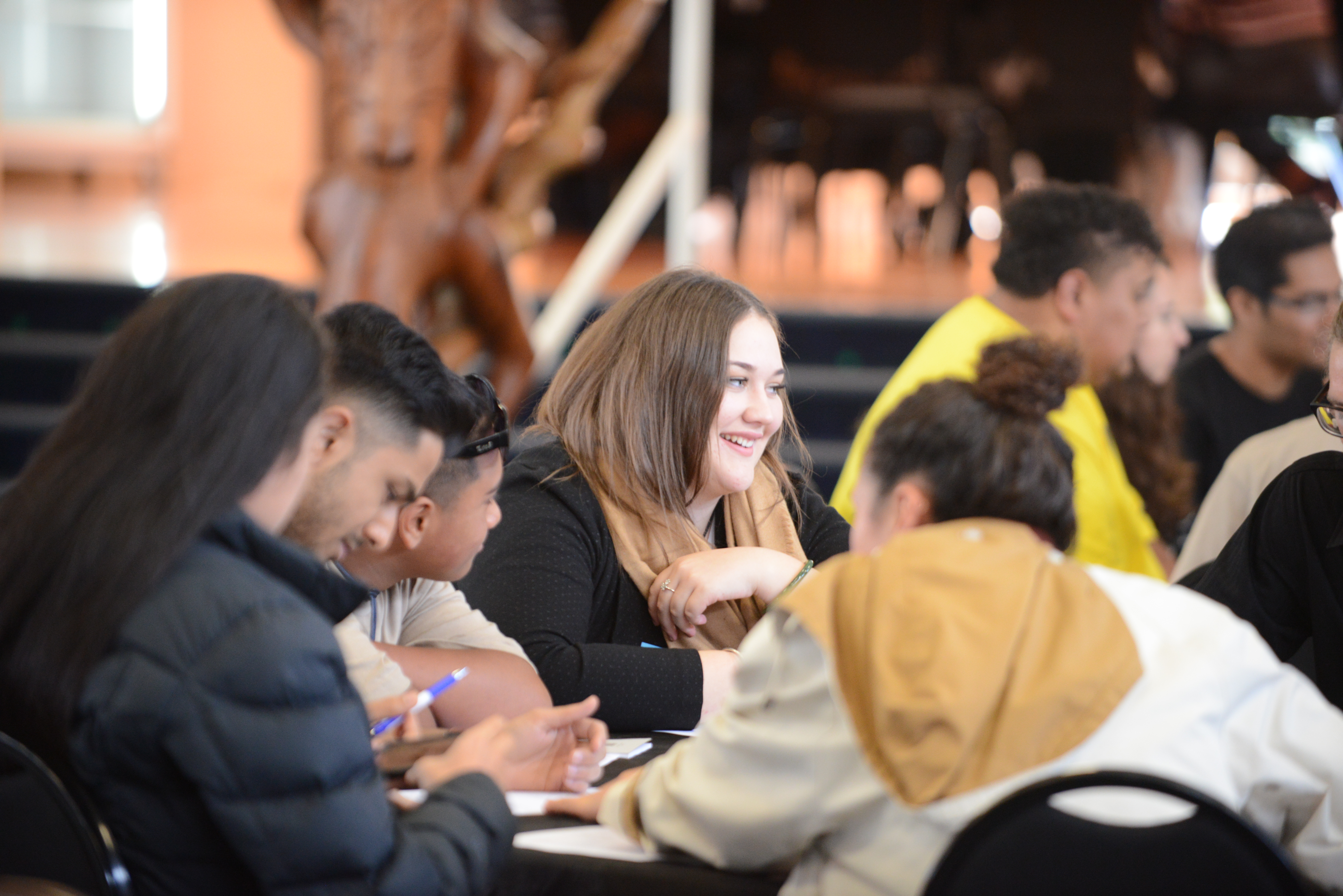 Young people consult and plan in small groups during the conference. (Credit: Ben Parkinson)