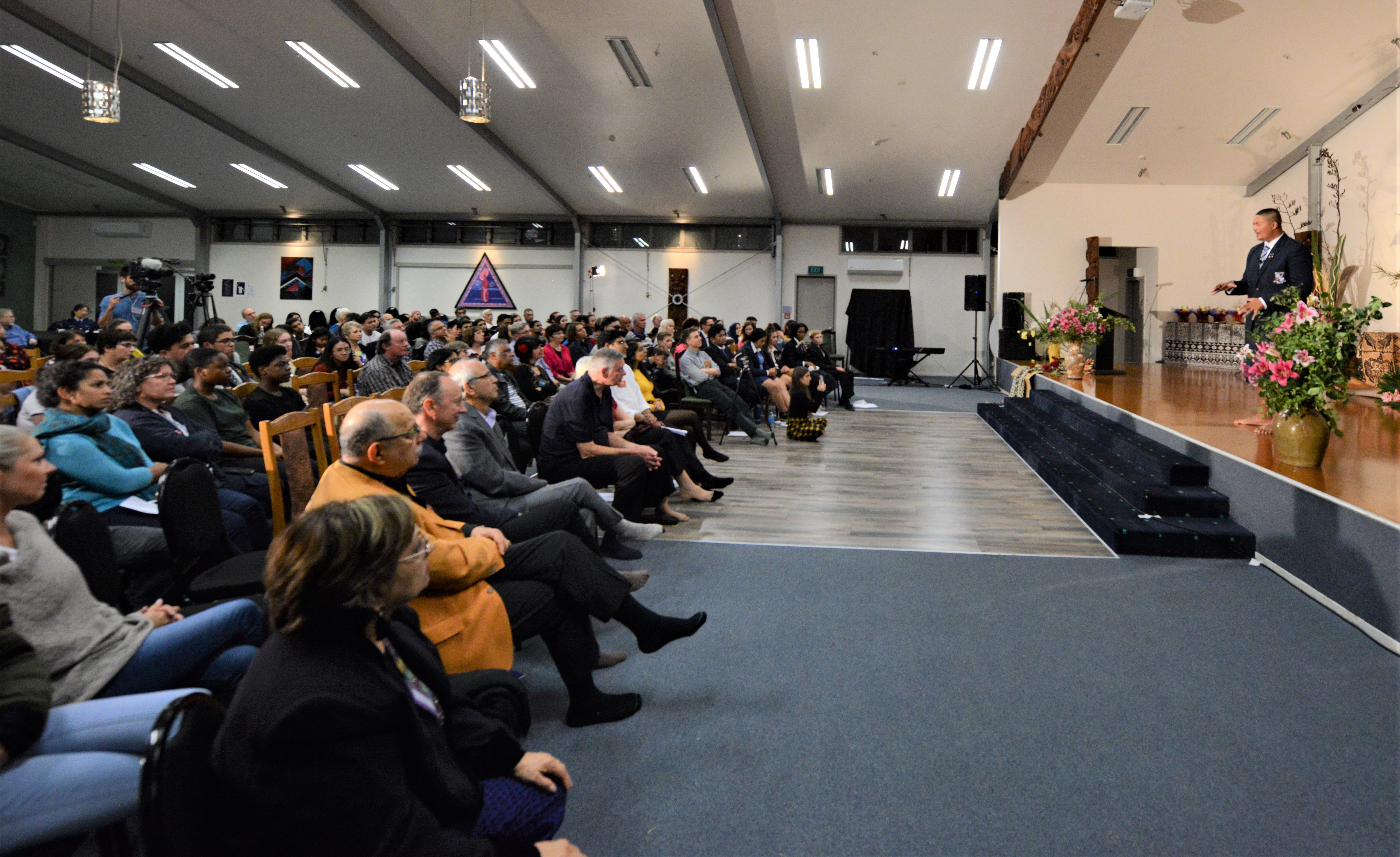 One of the youth speakers, David Faalau-Solia of Sacred Heart College in Auckland (right), delivers his speech to the audience during on Saturday at the Te Mahurehure Marae. (Credit: Ben Parkinson)