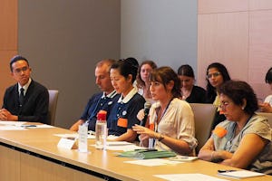 A participant speaks during the Baha’i International Community’s panel discussion on building local ownership in disaster recovery.