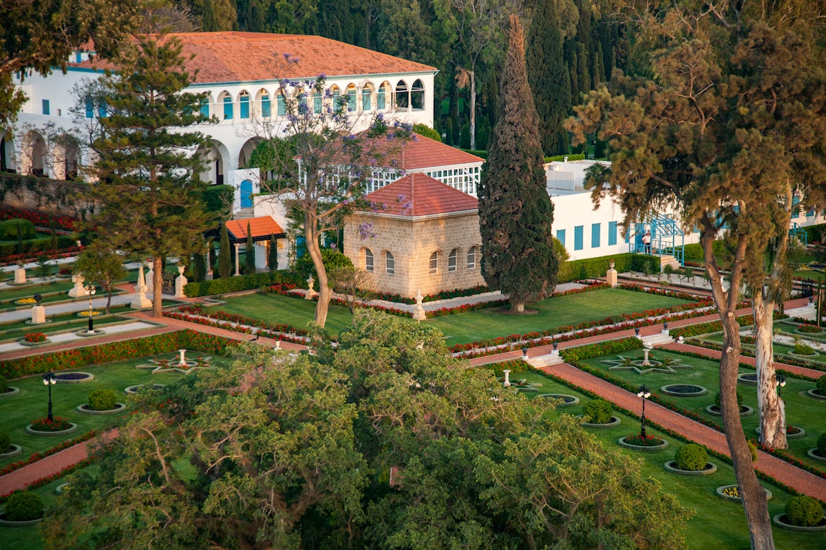 As greater numbers of people from around the world visit the Holy Land for Baha’i pilgrimage, its transformative power is being felt by individuals and communities. This aerial photo shows the Shrine of Baha’u’llah in front of the Mansion of Bahji, two places that are visited as part of the current Baha’i pilgrimage program.