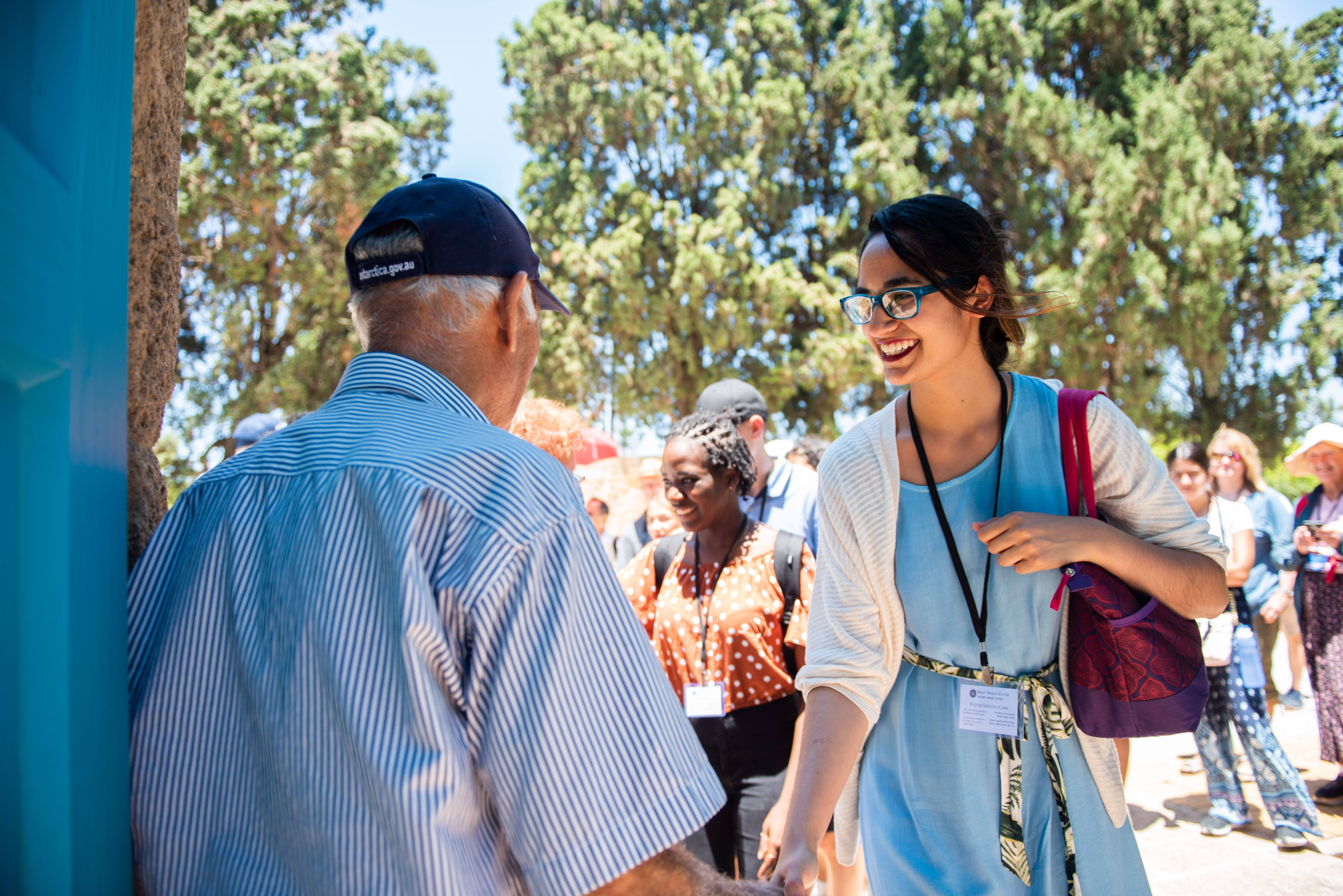 Pilgrims are greeted as they arrive at the Ridvan Garden in Akka, a place where Baha’u’llah would often visit.