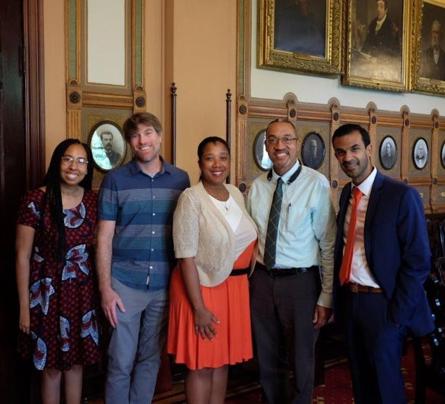 From left to right: May Lample, U.S. Baha’i Office of Public Affairs; Adam Rothman, the principal curator of the Georgetown University Slavery Archive; Maya Davis and Chris Haley, who curate and manage the Maryland State Archives Legacy of Slavery in Maryland Program; P.J. Andrews, U.S. Baha’i Office of Public Affairs.