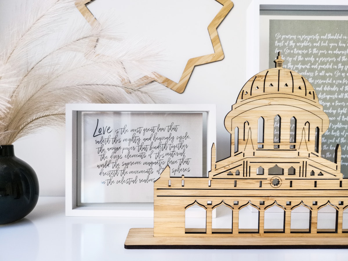 The laser wood art from Australia, depicting the Shrine of the Bab in Haifa, was created for the occasion of the bicentenary of the birth of the Bab.