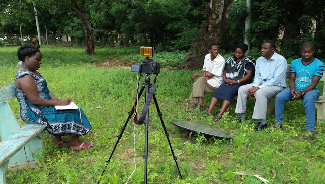 In Kenya, a film team is interviewing a family about the history of the Baha’i Faith in their country.