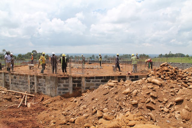The Kenya Temple’s construction crew carefully laid stones, on which concrete was later poured to form the building’s foundation.