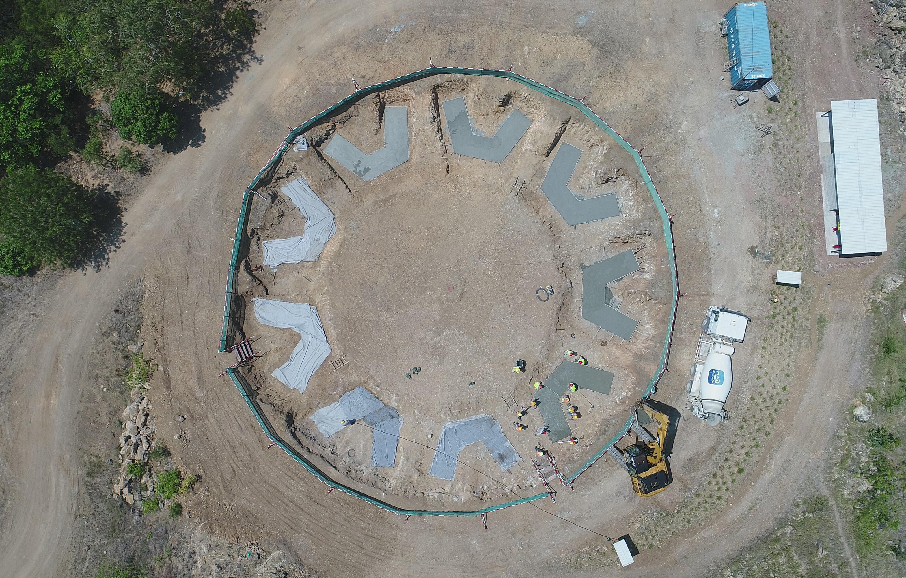 The Temple site earlier in the construction process, with concrete pads built onto the soil