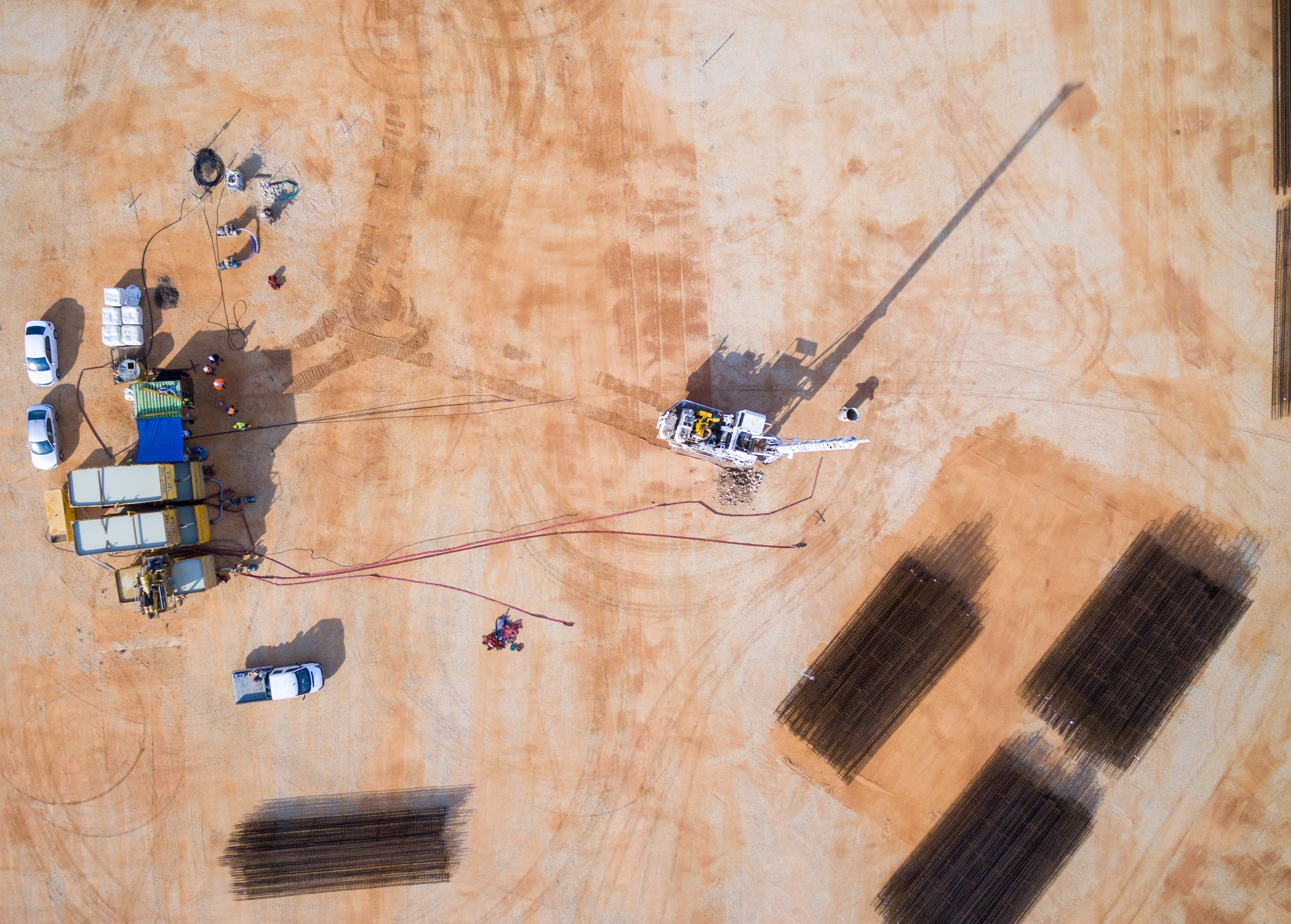 On the site of the Shrine of ‘Abdu’l-Baha, equipment and material are prepared for foundation work.