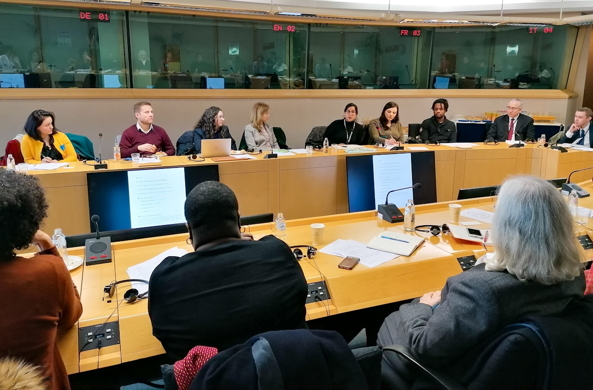 Attendees of the European Parliament panel discussion in which some 40 policymakers and civil society representatives discussed how to transcend differences through unifying language.