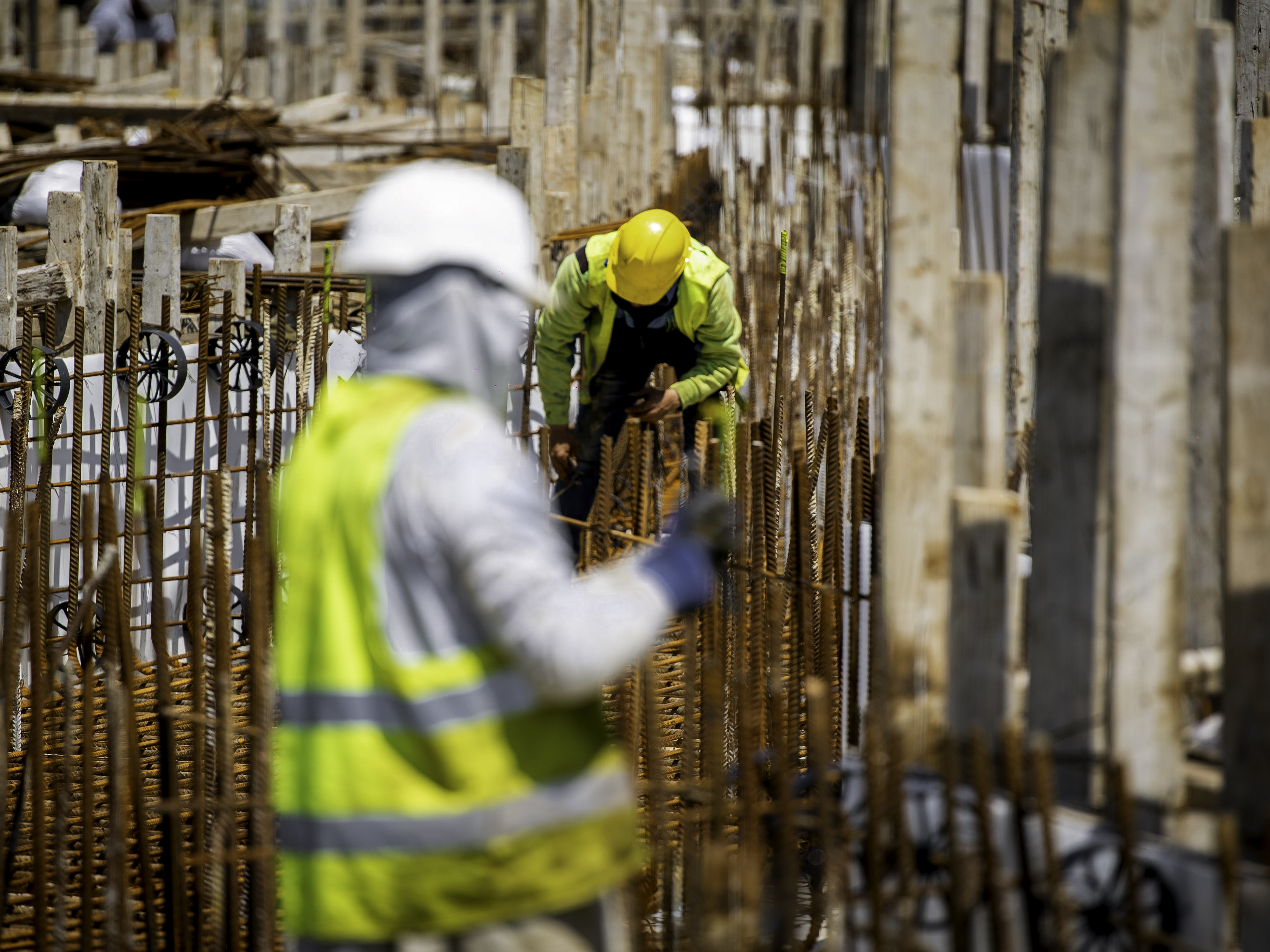 Work to lay the foundations that will support the north and south entrances leading toward the central structure and the walls that will enclose an inner garden.