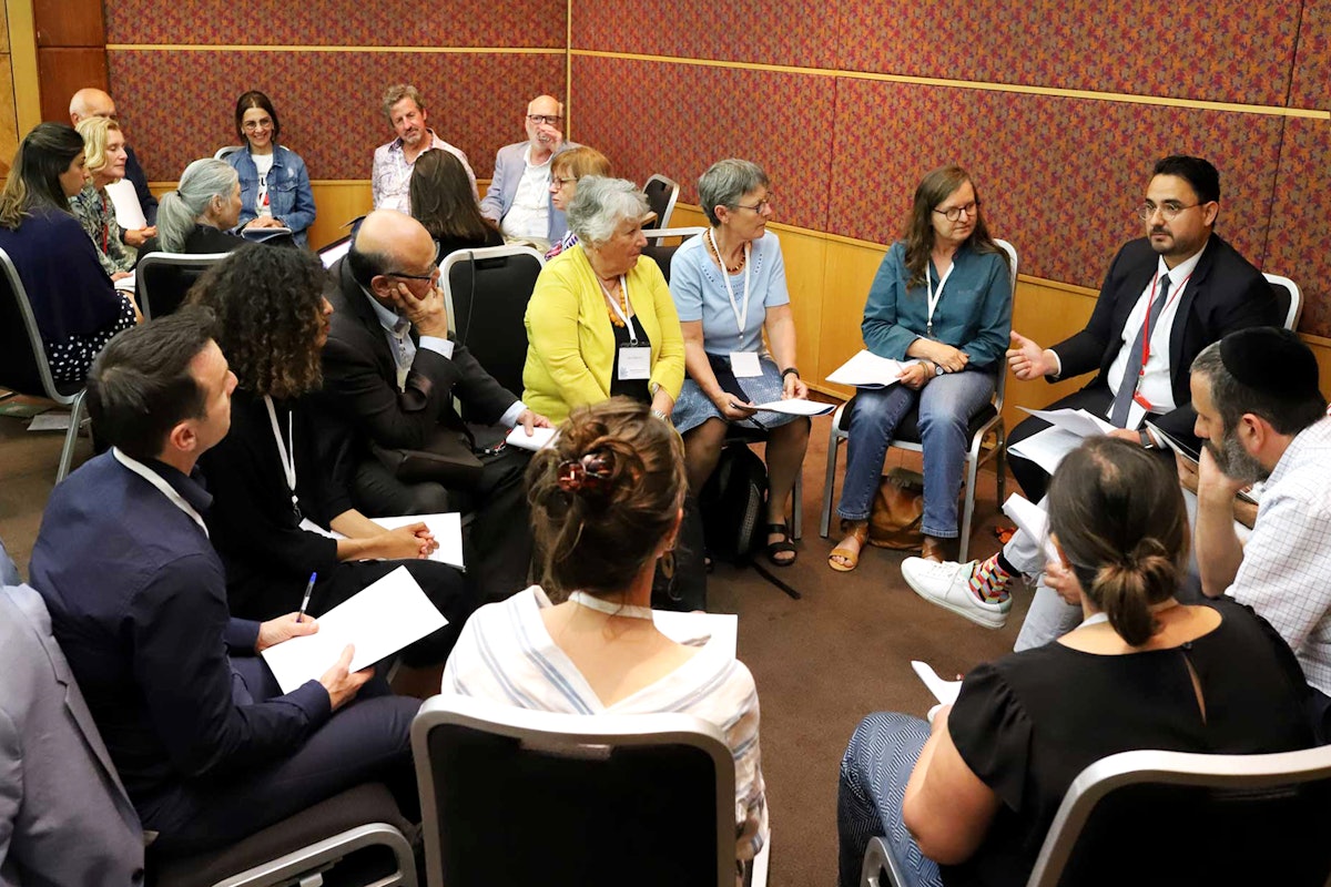 Photograph taken before the current global health crisis. The Australian Baha’i community holds periodic roundtables, such as the one featured here, with diverse social actors, academics, and faith communities to advance conversations on social cohesion.
