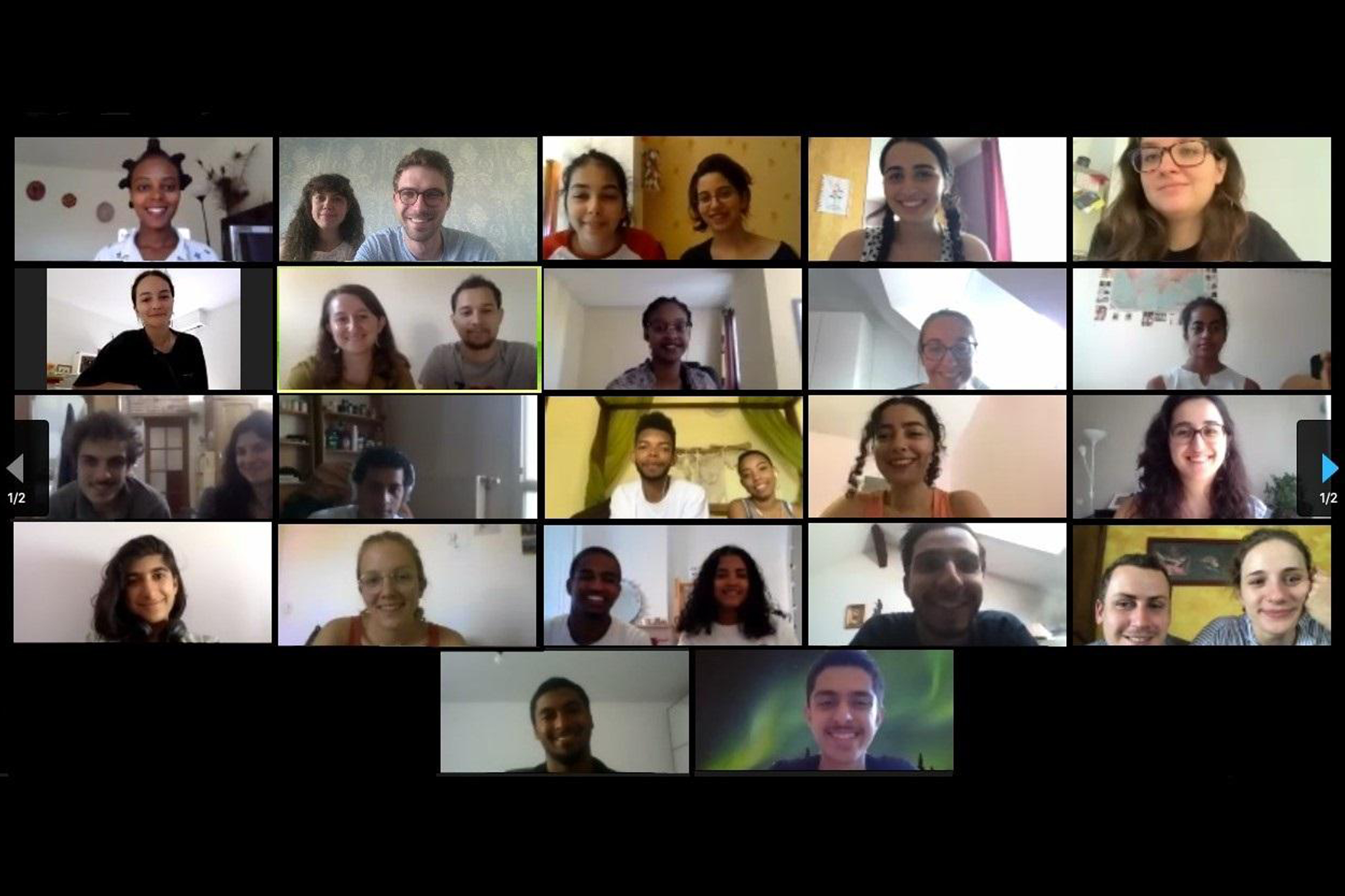 A group of students consult during a gathering of ISGP in France.