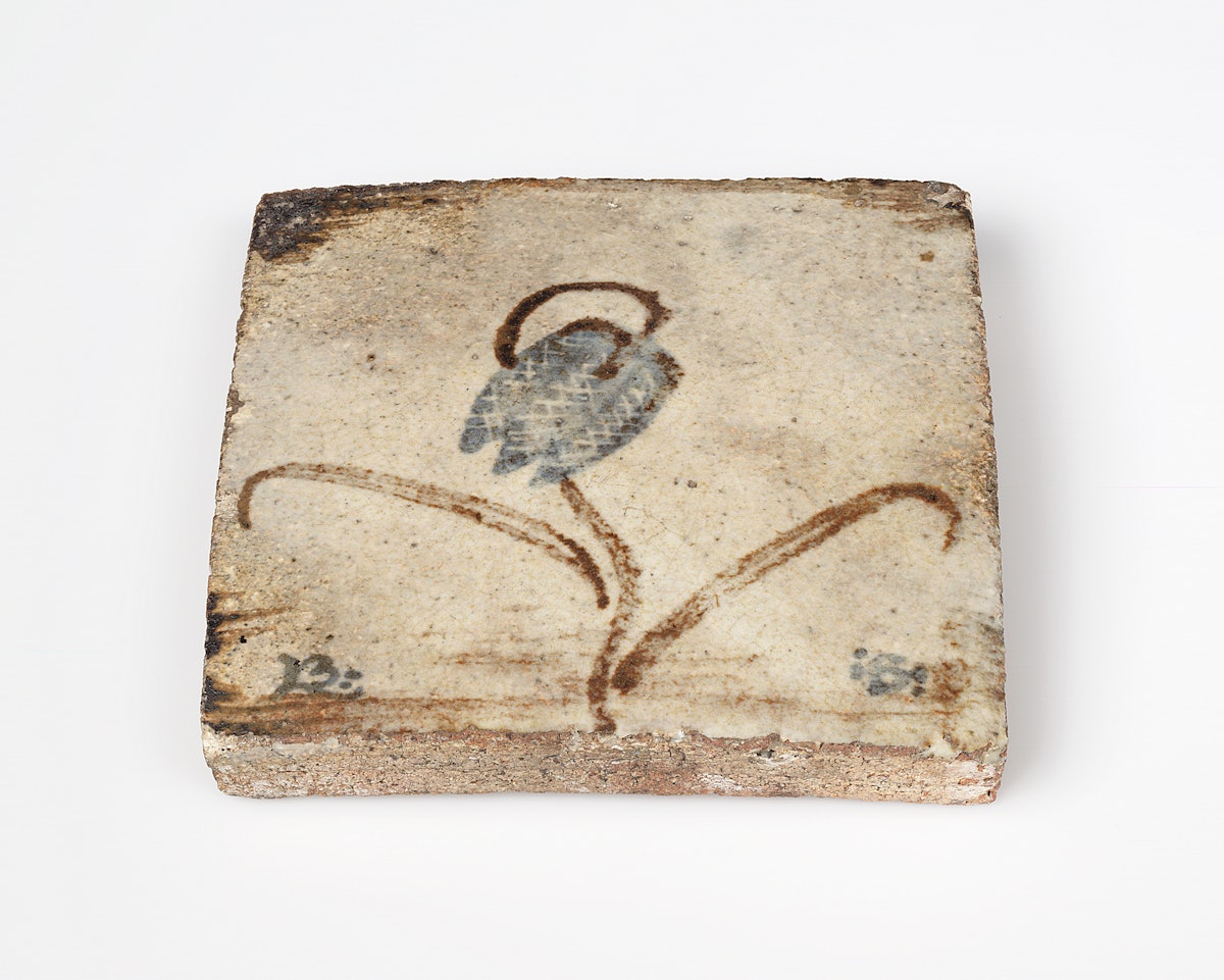 A tile by Bernard Leach, c.1928 on show in the Kai Althoff Goes with Bernard Leach exhibition at the Whitechapel Gallery, London. From the Bernard Leach archive at the Crafts Study Centre, University for the Creative Arts.