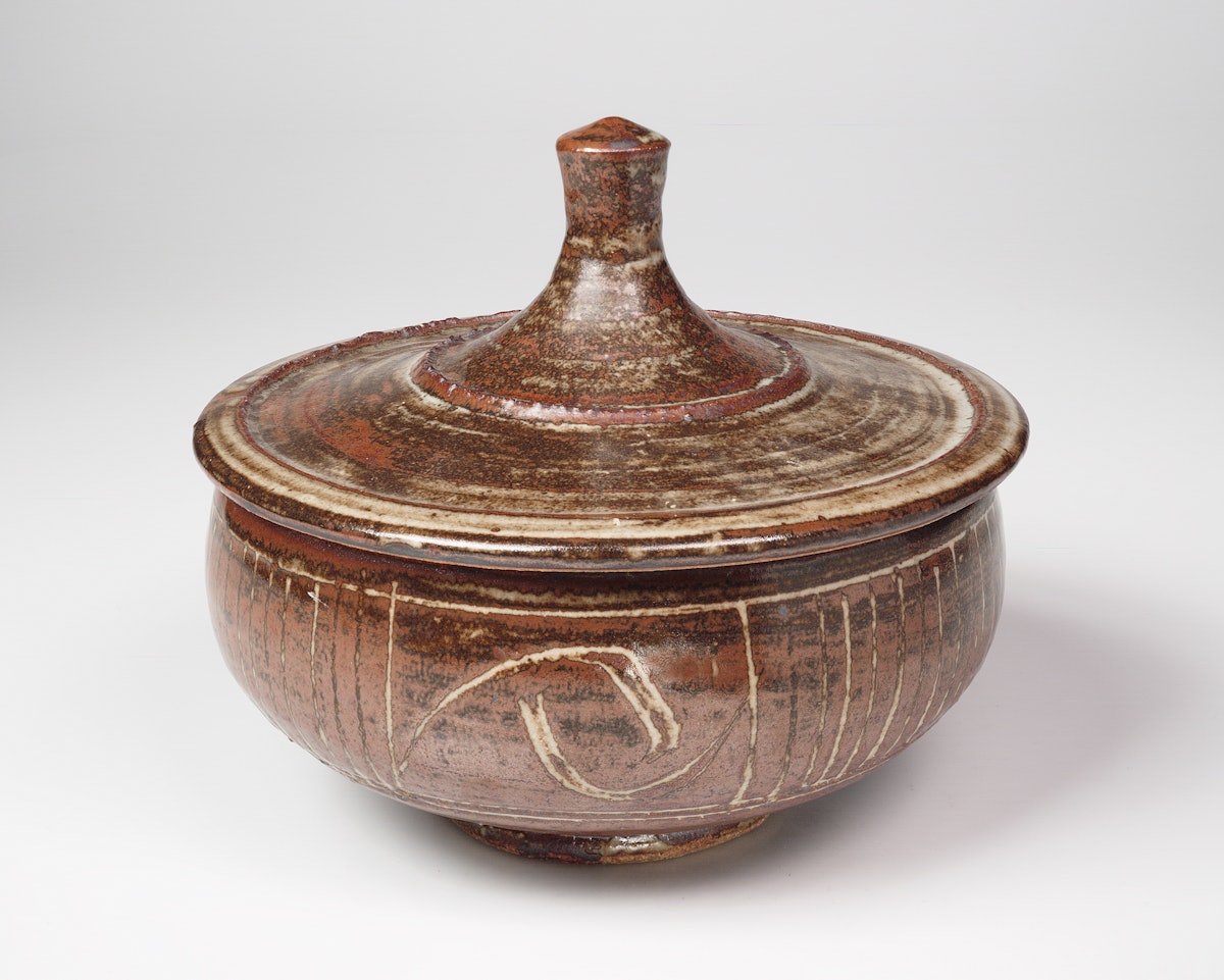 Bernard Leach, ‘pagoda pot’, 1970s.  The lid relates to the roof of the Temple of Heaven in Beijing. © Crafts Study Centre, University for the Creative Arts, P.75.105.a-b.