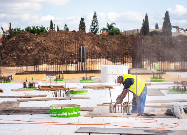 “Void former” blocks are fitted together to separate the concrete platform from the soil.