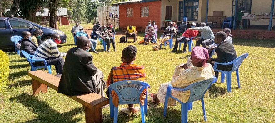 Members of the community discussing the future of the temple. The local House of Worship will be a center of community life in Matunda Soy, inspiring acts of worship and service throughout the area.