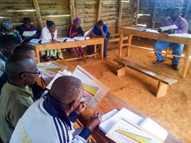 Photograph taken before the current health crisis. Community members in Chanjavu are trained as health educators.