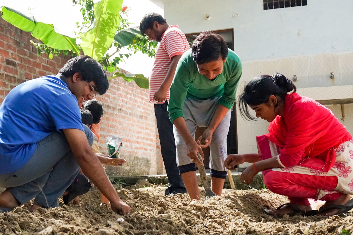 Photograph taken before the current health crisis. Participants of a Bahá’í-inspired agricultural initiative in India develop skills for local agriculture. A seminar held by the Bahá’í Chair for Studies in Development at Devi Ahilya University, Indore, highlighted the role of local participation in addressing food security.