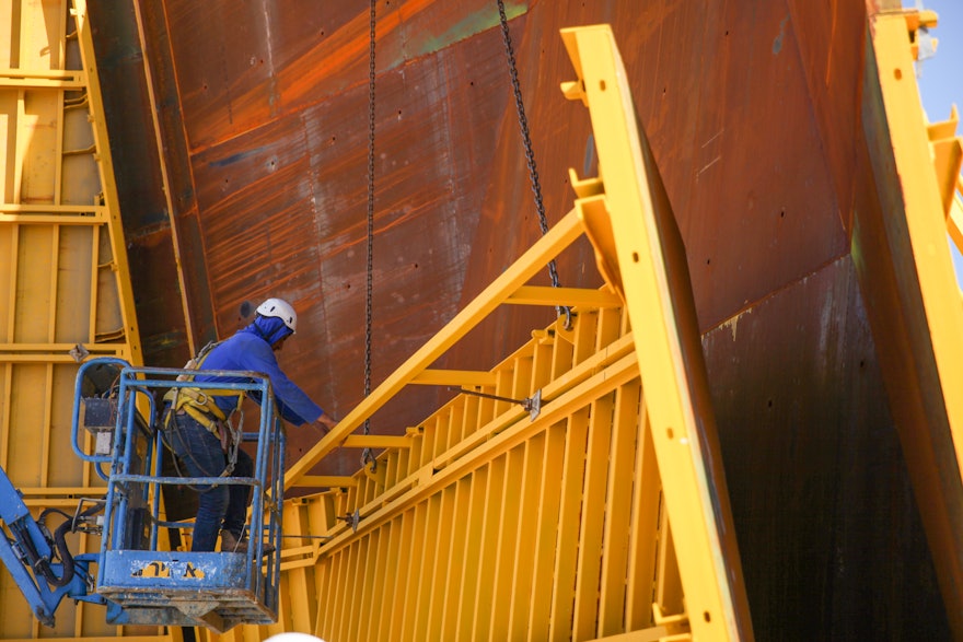 The gap between the steel panels will be filled with concrete to form a single wall segment.