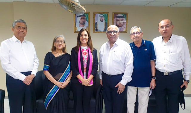In-person gathering held according to safety measures required by the government. Representatives of the Bahá’í community of the United Arab Emirates meet with leaders of other religious communities in an interfaith gathering hosted by the Hindu community in November 2020.